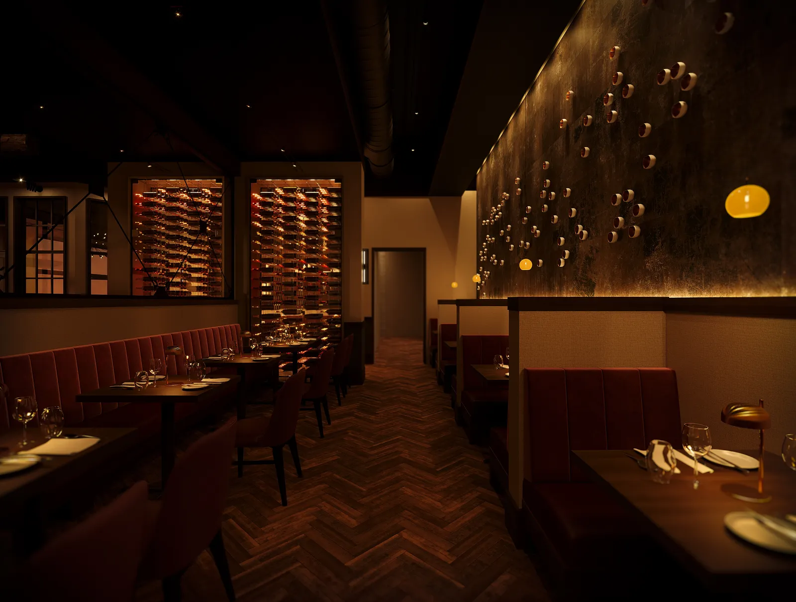 Booth seating with wine displays and a sculptural wall