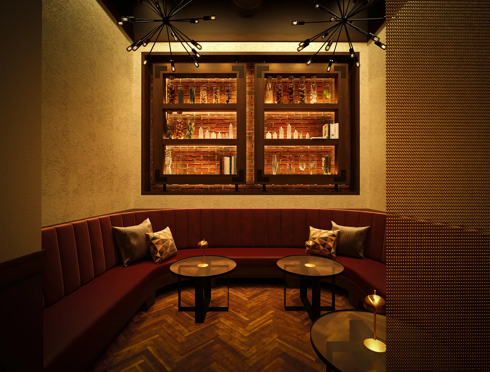 Red velvet lounge banquette under a back-lit bottle display
