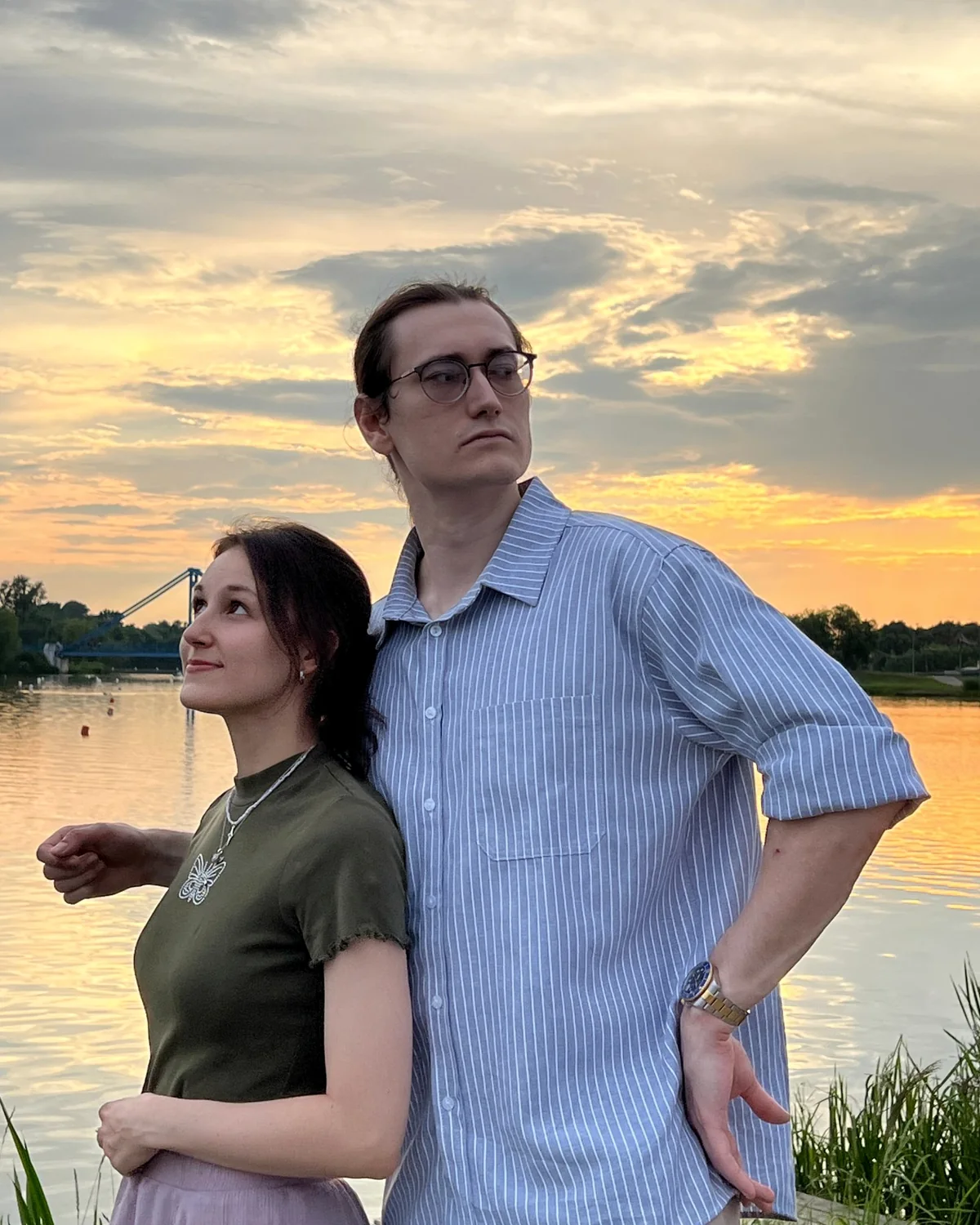 Alex and Alexandra Lane by a lake at sunset