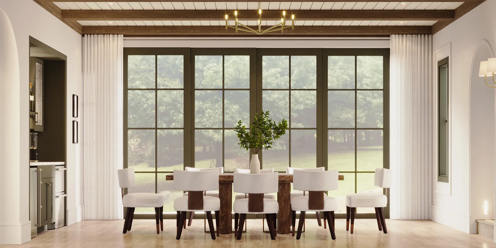 Dining table in front of a wall of steel windows