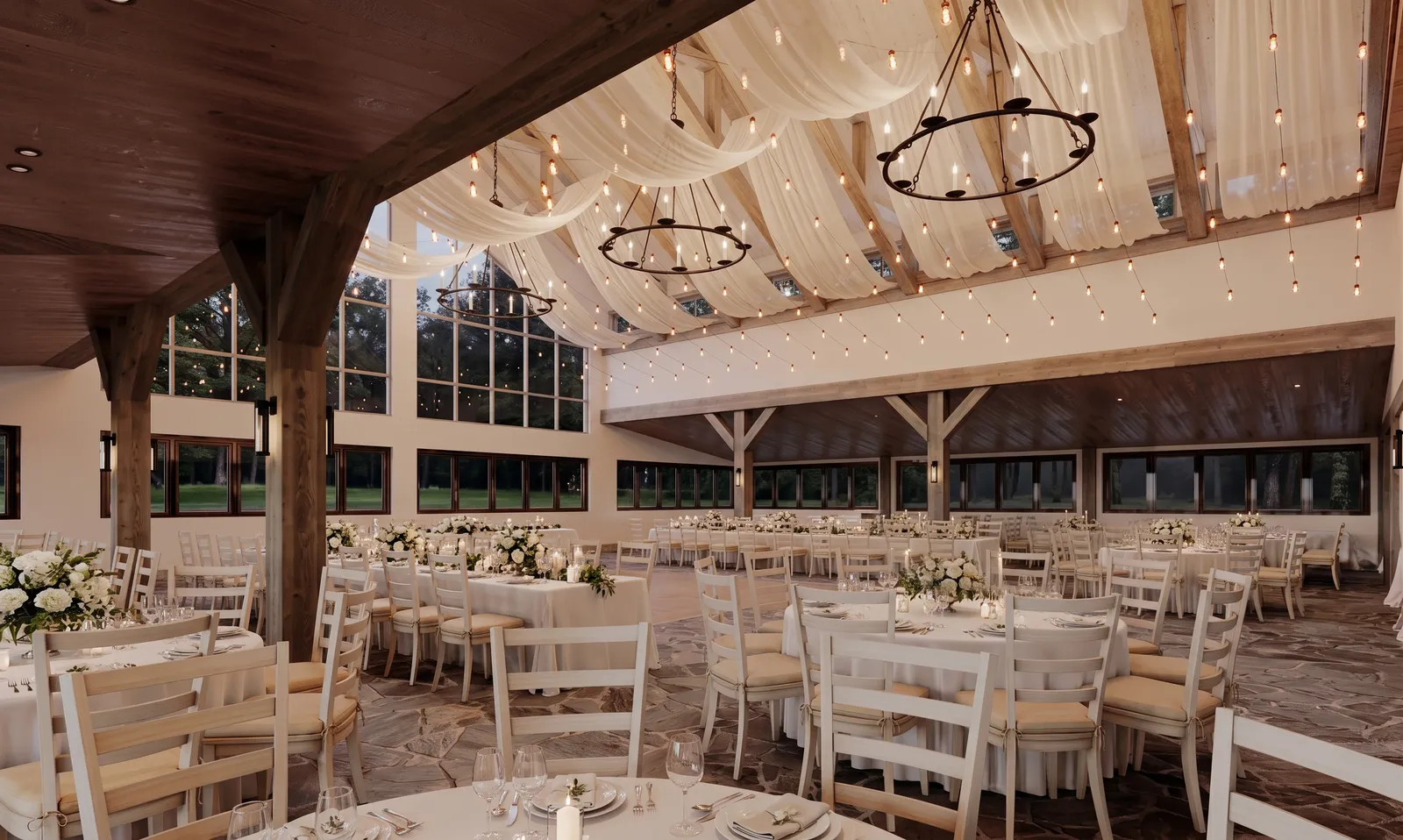 Reception at dusk under a draped ceiling